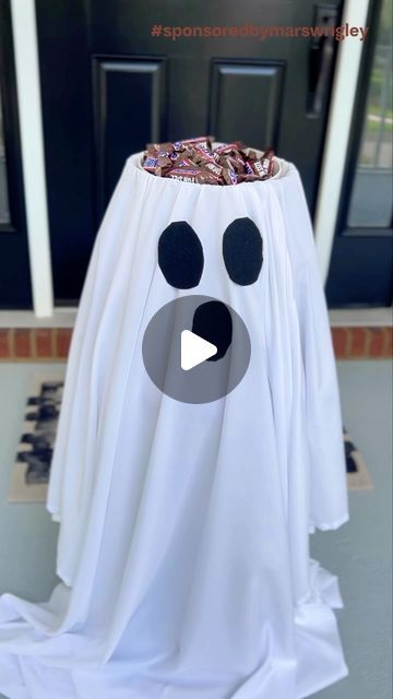 Mackenzie Biehl on Instagram: "#SponsoredByMarsWrigley  Be the ghostess with the mostest this spooky season with this DIY Halloween candy bowl filled with SNICKERS® Fun Size chocolates for a fa-boo-lous treat! 
Supplies: 👻
Stool 
Small basket
Large bowl
White sheet
Black felt (you can buy peel and stick)
You probably have all the supplies you need at home and can buy SNICKERS® in-store & online at your favorite retailer! 
@snickers #ad
© 2024 Mars or Affiliates." Diy Halloween Candy Bowl, Snickers Ad, Ghost Candy Bowl, Witch Cookies, Halloween Witch Cookies, Diy Halloween Candy, Witch Cookie, Halloween Candy Bowl, Ghost Diy