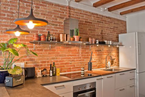 I lived in New York City for five years, so imagine my excitement when we found original red bricks behind the white wall plaster. Exposed Brick Walls Kitchen, Brick Wall Kitchen Ideas, Red Brick Kitchen, Brick Slips Kitchen, Brick Kitchen Wall, Kitchen With Brick Wall, Kitchen Brick Wall, Exposed Brick Kitchen, Brick Wall Kitchen