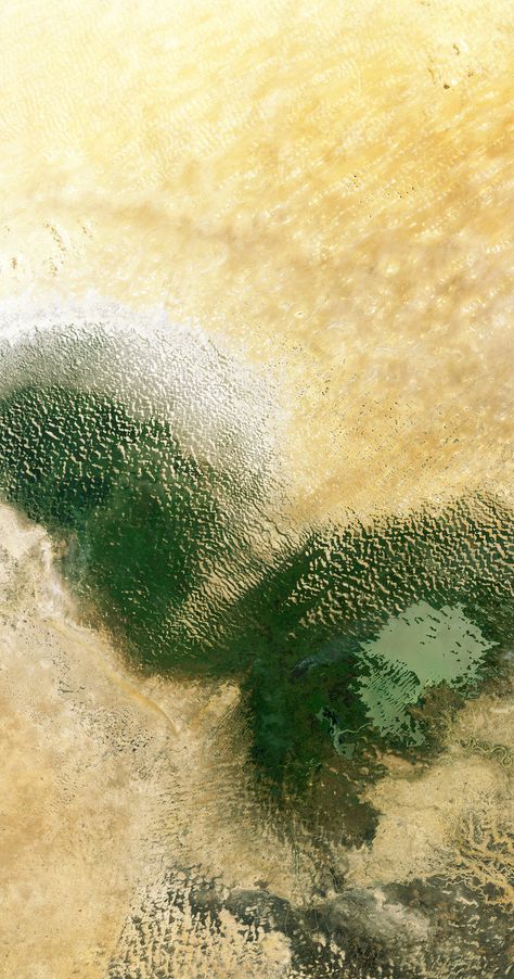 This Landsat-8 image from 4 July 2014 shows Lake Chad in West Africa’s Sahel region – a transition zone between the Sahara Desert to the north and savannahs and woodlands to the south. - Credits: USGS/ESA Satellite Photos Of Earth, Photo From Above, Savannah Desert, Aerial Views Landscape, Hell Angels, Lake Chad, Higher Perspective, Planet Photography, Aerial Photography Drone