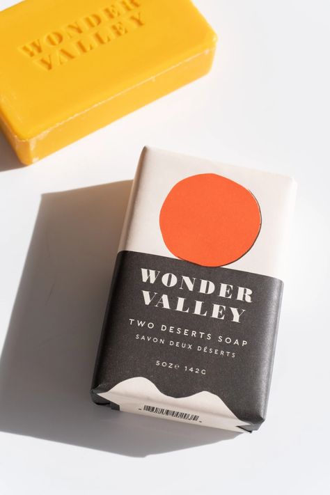 Plant-based soap made with Wonder Valley Olive Oil.  Highly moisturizing with an intoxicating scent of juniper, sage, vetiver, galbanum, eucalyptus, cardamom and smoke. Naturally pigmented a golden orange with beta carotene, no synthetic fragrances or dyes used. Each one stamped with Wonder Valley on the bar.  -5oz bar Wonder Valley, Olive Oil Brands, Unique Stocking Stuffers, Stocking Stuffers For Men, Cool Packaging, Beta Carotene, Soap Packaging, Essential Oil Fragrance, Olive Fruit