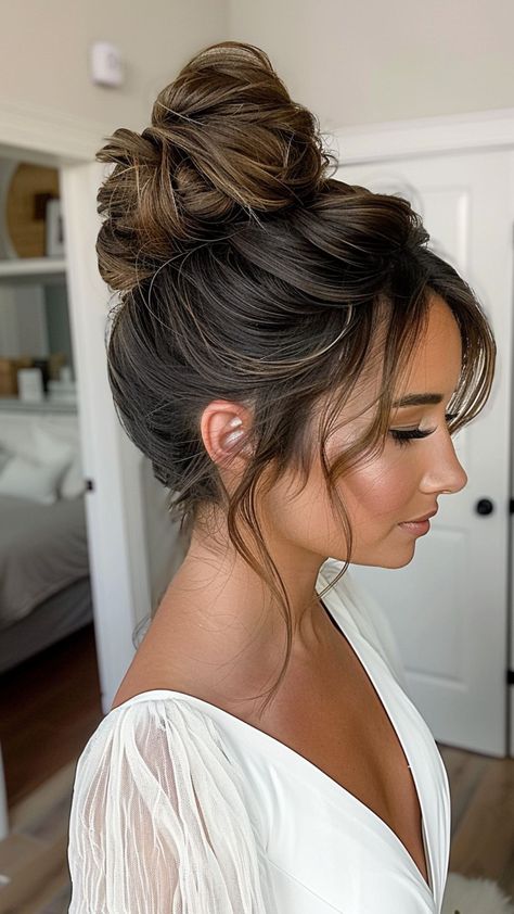 22 Wedding Hairstyle Ideas for Round Faces" Sophisticated Wedding Updo, Top Bun Updo Wedding, Hair In Front Of Face Hairstyles, Updo With Tendrils, High Wedding Bun Hairstyles, Elegant High Bun Wedding, Pulled Back Wedding Hairstyles, Front Of Bridal Updo, High Updo Hairstyles Wedding