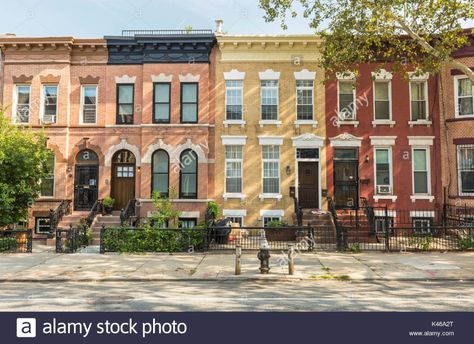 A row of multi-colored brick apartment buildings on St. John Placein the Crown Heights Neighborhood of Brooklyn, New York Stock Photo Brick Apartment, Small Apartment Building, New York Landmarks, Row Houses, Apartment Buildings, Crown Heights, New York Apartment, Row House, Sims House