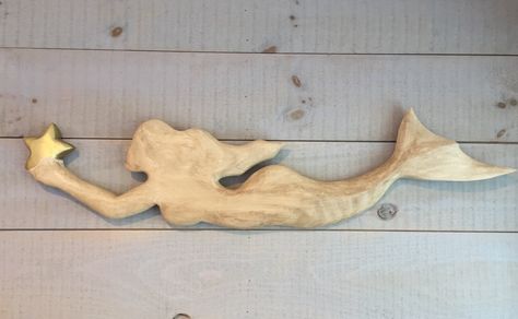 Wood carved mermaid #mjpilottedesigns #coastalliving #nantucket #mermaid Mermaid Wood Carving, Wood Carved Mermaid, Practice Doodles, Mermaid Wood, Wooden Mermaid, Jigsaw Projects, Carved Mermaid, Mermaid Sculpture, Wood Carving Faces