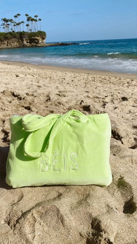 Neon green beach bag in the sand, bag converts into a towel Towel Beach Bag, Beach Pouch, Summer Accessories Beach, Summer Towel, Beach Towel Bag, Neon Bag, Brand Archetypes, Travel Quotes Wanderlust, Travel Quotes Adventure