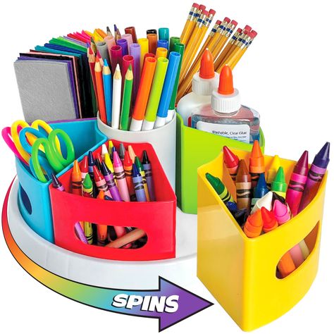 PRICES MAY VARY. SET INCLUDES: The Hapinest Craft Supply Organizer features a rotating base measuring 10 inches in diameter, with 6 brightly colored outer container cups and 1 center cup. ORGANIZED STORAGE: Keep your child's art supplies organized and within reach at home or school. Great for grouping crayons, markers, colored pencils, glue sticks, scissors, and more. Use center cup for hand sanitizer or additional supplies as needed. RESOURCE SHARING: Perfect for teachers to use in classroom se Art Supplies Organizer, Kids Desk Organization, Art Caddy, Art Supplies Storage, Art Supply Organization, Organize Craft Supplies, Pencil Organizer, Pencil Storage, Storage Caddy