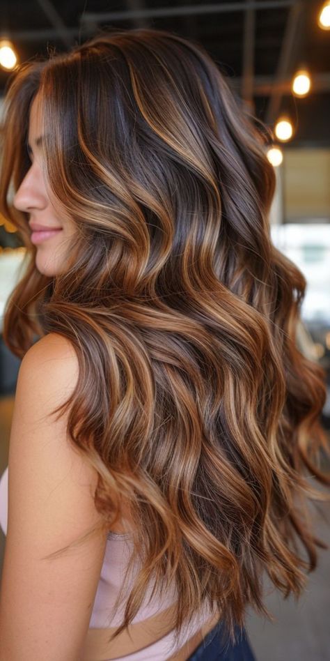 Discover the beauty of caramel balayage hairstyles and haircuts with these stunning examples. From subtle caramel highlights to bold balayage techniques, these looks are sure to turn heads. Whether you prefer a natural sun-kissed effect or a more dramatic contrast, caramel balayage offers versatility and dimension to any hairstyle. Elevate your look with these gorgeous caramel tones today! #CaramelBalayage #HairInspiration #BalayageHair #TrendyHairstyles Dark Root Caramel Balayage, Caramel Brown Ombre Hair, Caramel Balayage Long Hair Brunettes, Caramel Brunette Balayage Hair, Chocolate Brown With Caramel Balayage, Bayalage Brunette Caramel Honey Short, Auburn Carmel Balayage, Brunette With Red Highlights Caramel, Caramel Hair Ideas