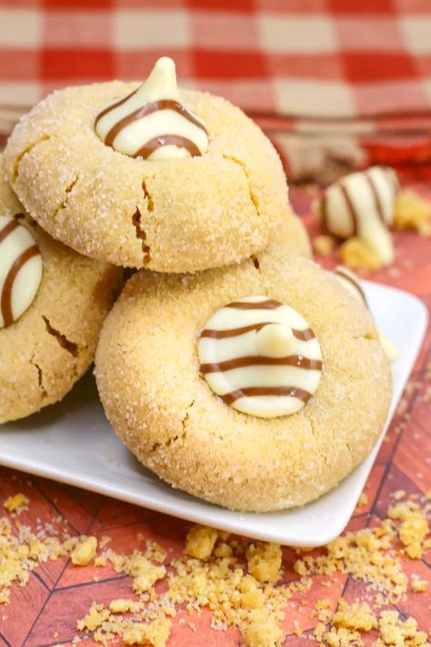 These peanut butter blossom cookies are hands down the BEST out there! They are so soft, so easy to bake, and are the perfect Christmas cookie recipe! You can't go wrong with Hershey's kisses, afterall. #holidaybaking #cookierecipe #easyrecipe The Best Cookie Recipes, Kiss Cookie Recipe, Bar Treats, Peanut Butter Blossoms Recipe, Hershey Kiss Cookies, Peanut Butter Blossom, Peanut Butter Kiss, Peanut Butter Kiss Cookies, Soft Peanut Butter Cookies