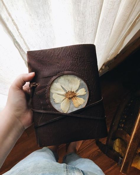 Kaia Bakken on Instagram: "First book for the shop update! I’ll have a few resin, a few leather, and some wall art for you all - hopefully by the end of the month?! Life with four babes in four years is no joke. 👌🏼 #dustlingandhart" Earth Style, Leather Book Covers, Leather Journal Cover, Leather Crafting, Leather Book, Leather Books, Book Binding, Journal Covers, Leather Journal