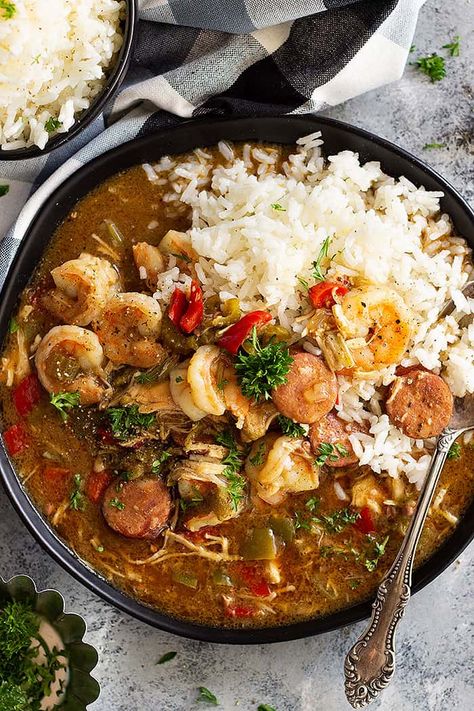 Slow Cooker Chicken, Sausage, and Shrimp Gumbo is a wonderfully hearty meal made easy with the crockpot! This New Orleans inspired dish is full of flavor and feeds a crowd! Easy Shrimp Gumbo, Best Gumbo Recipe, Shrimp Gumbo Recipe, Shrimp And Sausage Gumbo, Creole Gumbo, Shrimp Gumbo, Chicken Gumbo, Shrimp Sausage, Sausage Gumbo