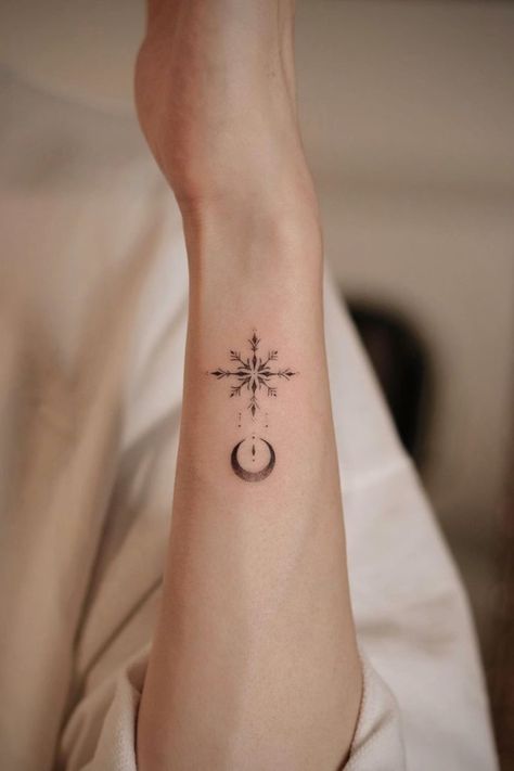 Top 21 Stunning Snowflake Tattoo Ideas Small Snowflake Tattoo, Ice Tattoo, Chandelier Tattoo, Snowflake Tattoo, Winter Tattoo, Snow Tattoo, Sky Tattoos, Snow Flake Tattoo, Rose Tattoos For Women