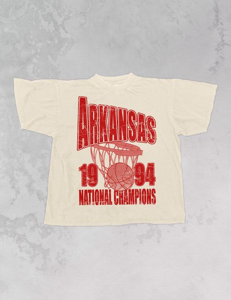 Show support for your favorite team Game Day in our Arkansas Basketball National Champions oversized vintage 90's basketball inspired tshirt!- Features the word "Arkansas" across the top in oversized lettering with a basketball hoop underneath and "1994 National Champions" underneath it all in a red ink- Screen print transfer that is heat pressed onto each tshirt- Printed on a vintage feel, garment dyed t-shirt that gets softer with each wash.- Oversized fit- Sizing translation: XS/S = L , S/M = XL , L/XL = 2XL , 2XL/3XL = 3XL- 100% Cotton**due to screens & filters color may vary from pictures** Band T Shirts Design, Cool Sports Shirts, Vintage Christian Tshirt, Vintage Basketball Shirts, Vintage Sports Shirt Design, Event Tshirt Design Shirt Ideas, Vintage Merch Design, Athletic Shirt Design, Vintage Sports Shirt