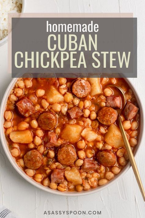 An overhead shot of a bowl of the best potaje de garbanzo with a spoon in it and the words "homemade cuban chickpea stew" in the foreground Potage Recipe, Garbanzo Bean Recipes, Garbanzo Bean, Cuban Dishes, Sliced Avocado, Cuban Cuisine, Chickpea Stew, Stewed Potatoes, Bean Stew