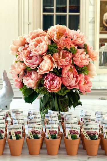 Flowers always look prettiest when they look like they were gathered from the yard, simple and loose, and seasonal. I love small clay pots of blooming flowers, geraniums, miniature roses, begonias or even herbs lined up on a beautifully-done table. I love that juxtaposition.   - HouseBeautiful.com Garden Party Favors, Cheap Wedding Centerpieces, Garden Party Bridal Shower, Party Seating, Succulent Centerpieces, Garden Party Decorations, Wedding Favors Cheap, Garden Party Wedding, Wedding Party Favors