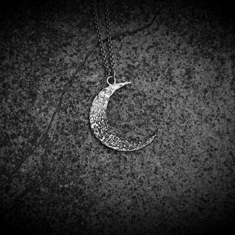 • Lunar Tides • The 'Lunar Tides' necklace is a celebration of all things celestial and textured. Crater like patterns formed by molten wax, the liquidity following the heat much like the tides follow the Moon. This is a re-imaging of the previous textured crescent I made some time ago, but the textures just didn't feel right to me, too angular and precise. These organic, molten textures feel much more fitting. #hexarcana #amuleticarmour #amulet #talisman #talismanicmagic #lunartides #cele... Moon Amulet, Lunar Tide, Crescent Moon Necklace Silver, Crescent Moon Necklace, Leather Chokers, Moon Necklace, Crescent Moon, Natural Oils, Cable Chain