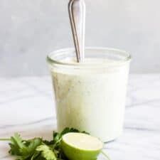 Homemade Ranch Dressing bursting with fresh herbs, avocado, and a hint of lime juice. Perfect for using as a salad dressing or as a dip! #salad #dressing #avocado #ranch Homemade Avocado Ranch Dressing, Avocado Ranch Dressing Recipe, Avocado Sour Cream, Low Carb Dressing, Vegetarian Sauces, Creamy Cilantro Dressing, Green Goddess Salad Dressing, Avocado Ranch Dressing, Salad Topping