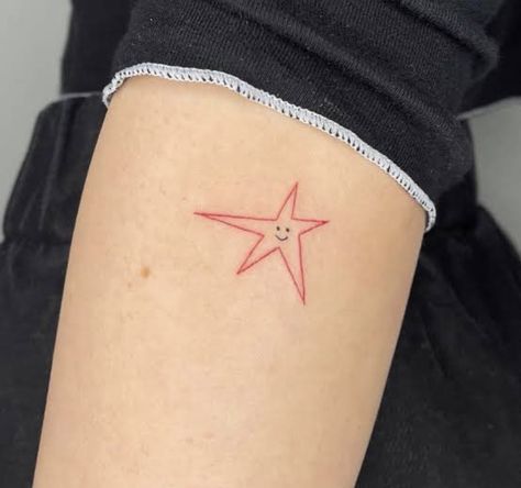 gracie abrams red smiley face star tattoo Smiley Face Tattoo, Small Star Tattoos, Tattoo Coloring Book, Star Tattoo, Red Ink Tattoos, Red Tattoos, Subtle Tattoos, Dainty Tattoos, Aesthetic Tattoo