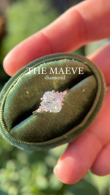 Brianna Trudell on Instagram: "(SOLD) My diamond Maeve is here! This ring features a 1.52 CT E, VVS2 lab grown diamond, and is set with natural diamond accents, in 14K yellow gold ✨ Available Friday! I would love to feature all of my designs with diamonds—yay or nay, my good people! #uniquejewelry #vintageengagementring #uniqueengagementring #lavendercreekgems #jewelrydesigner #ovaldiamond #engagementring #engaged" The Maeve Diamond, Maeve Diamond Ring, The Maeve Engagement Ring, The Maeve Ring, Maeve Engagement Ring, Unique Classy Engagement Rings, Engagement Rings Colored Stones, Low Setting Engagement Ring, Maeve Ring