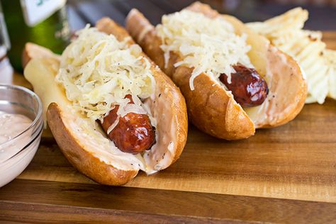 The Smoked Sausage "Reuben" Roll with Homemade Russian Dressing Roll Sandwiches, Sausage And Sauerkraut, Homemade Russian Dressing, Pretzel Roll, Sausage Sauerkraut, Hand Pies Savory, Wraps Recipes, Pretzel Rolls, Sandwiches Wraps