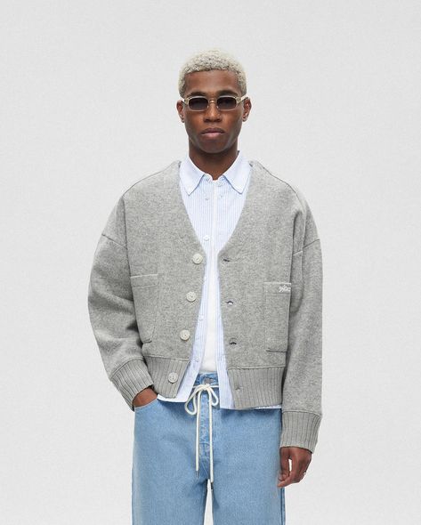 A closer look at our april:capsule 1. Our best-selling Cropped Wool Cardigan launching in Heather Grey, also restocking in all colour ways 2. Knitted Football Shirt in Ecru / Estate blue, styled here with our Light-Wash Pleated Denim Shorts, launching later this year 3. The Chain Stitch detailing on our Banner Crewnecks, launching in Ecru and Black 4. Our new Sports Division Tee, a more classic fit compared our usual cropped and boxy t-shirts 5. The badge detail and our new fine gauge kn... Knit Shirt Outfit, Mens Streetwear Urban, Mens Spring Fashion Outfits, Outfits With Grey Cardigan, Aesthetic Guy Outfits, Mens Smart Casual Outfits, All Colour, Pleated Denim, Mens Shorts Outfits