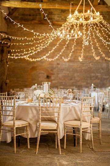 These rustic wedding lighting ideas are to die for! Check out our Top 10 Rustic Wedding Ideas You Can Actually Do for more inspiration! Barn Wedding Decorations, Wedding Chandelier, Shabby Chic Wedding, Wedding Decor Elegant, Barn Wedding Venue, Rustic Chic Wedding, Hula Hoop, Wedding Lights, Rustic Chic