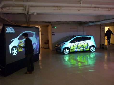 The YrWall Digital Graffiti Wall in use at the Chevrolet Spark Tour launch Car Activation Ideas, Digital Graffiti Wall, Graffiti Installation, Digital Activation, Interactive Digital Wall, Graffiti Video, Experiential Marketing Activations Car, Car Launch, Car Expo