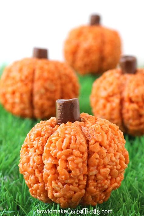 Fall is the perfect time to make pumpkin-shaped Rice Krispie Treats. These orange Rice Krispie Treat Pumpkins are easy to make and look great plain or decorated with vines and leaves or jack-o-lantern faces. #ricekrispietreats #pumpkins #halloween #halloweenrecipes Pumpkin Shaped Rice Crispy Treats, Pumpkin Shaped Rice Krispie Treats, Rice Crispy Pumpkins, Rice Krispie Turkey, October List, Pumpkin Rice Krispies, Fun Rice Krispie Treats, Orange Rice, Pumpkin Rice Krispie Treats