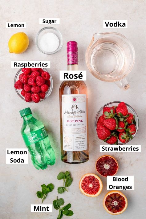 Summer Rose Sangria, Pink Sangria Recipes, Pink Sangria For A Crowd, Sangria With Rose Wine, All Pink Party Ideas, Sangria Party Ideas, Sparkling Rose Sangria, Valentine’s Day Sangria, Simple Pink Cocktails