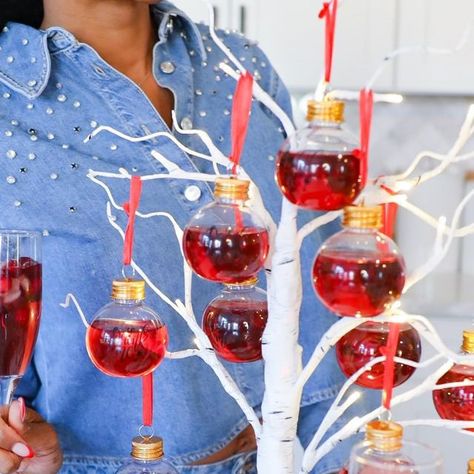 Ashley Dixon | Decor, DIY, Cleaning & Organization on Instagram: "Hosting ideas. Ornament drink tree. Here is another hosting idea to be the hostess with mimosas. Without a lot of effort these would be perfect for a holiday party. You could do different types of juices for a spin on a mimosa bar or add alcohol separately to allow for mocktails. Comment DRINKS below 👇🏽 to be sent everything that I used here to your DM. . . . #holidaydrinks #holidaycocktails #hostingideas #hostingaparty #hostesswiththemostess #ornamentdrinks #christmashosting #christmaspartyideas #amazonfinds #amazonhome #amazonhomefinds" Ornament Drink Ideas, Drink Tree, Ornament Drink, Mimosa Drink, Mimosa Tree, Cleaning Organization, Stella Rosa, Hosting Ideas, Grinch Party