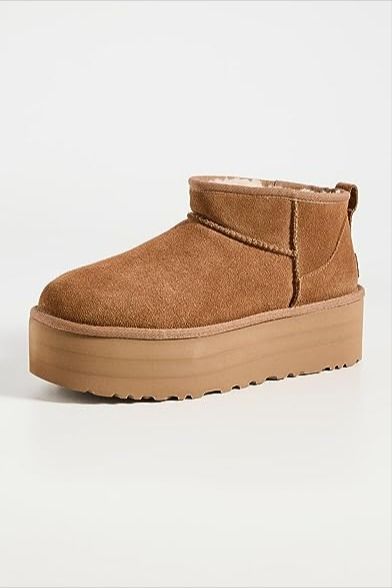 -Imported -Ethylene Vinyl Acetate sole -Shaft measures approximately Ankle from arch -Boot opening measures approximately 12.7" around -Suede upper -17mm UGGplush wool lining -17mm UGGplush wool insole -SugarSole EVA outsole -2" platform height Ugg Classic Mini Platform, Uggs Mini, Ultra Mini Uggs, Cute Uggs, Ugg Store, Classic Ugg Boots, Ugg Classic Mini, Ugg Classic Short, Ugg Classic