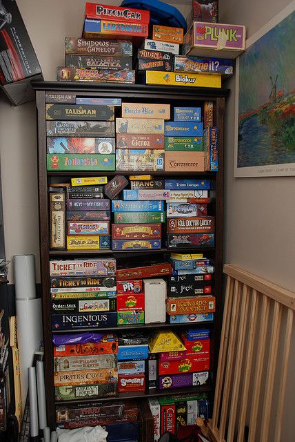 board games. i like them. we need more in the flat. Board Game Shelf, Dragon City Game, Game Shelf, Game Cabinet, Bored Games, Dream Basement, Board Game Storage, Hangout Room, Board Game Organization