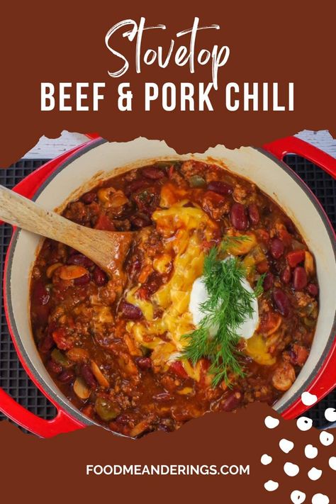 chili with cheese, sour cream and dill in a pot with a wooden spoon Chili With Ground Pork And Beef, Chili With Beef And Pork, Slow Cooker Ground Pork Recipes, Beef And Pork Chili Recipe, Ground Pork Chili, Southern Chili, Homemade Stove, Pork Chili Recipe, Stovetop Chili