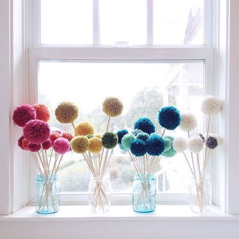 Pom poms are a perfect springtime substitute for flowers on your window sill. Pom Crafts, Pom Pom Flowers, Pom Pom Crafts, Boho Deco, Yarn Crafts, Pom Poms, Kids Crafts, Diy Art, Home Deco