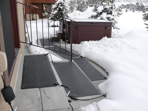 If you live where heavy snowfall already looms and your back, legs and shoulders already twinge with soreness at the thought of three months of morning and evening shoveling, perhaps it’s time something offered you and your trust snowblower and shovel companions a seasonal reprieve. HeatTrak heated floor mats are immensely cost efficient and consistently … Heated Walkway, Landscape Hillside, Snow Melting Mats, Heated Floor, Heated Driveway, Hot Tub Landscaping, Hot Tub Patio, Hot Tub Accessories, Hot Tub Deck