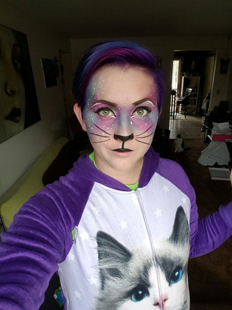 galaxy cat makeup for Halloween this year. inspired by my cats in space leggings! Space Cat Costume, Galaxy Theme Makeup, Galaxy Makeup Looks Easy, Galaxy Makeup Simple, Purple Space Makeup, Cat Costume Makeup, Space Leggings, Cat Halloween Makeup, Baked Eyeshadow