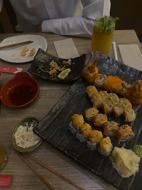 plate of sushi on the right and passionfruit mojito on top right corner chopsticks on the grey table Date Night Dubai, Dubai Date Night, Date Idea, Night Date, Date Night Ideas, Night Ideas, Fish And Chips, What To Cook, In Dubai