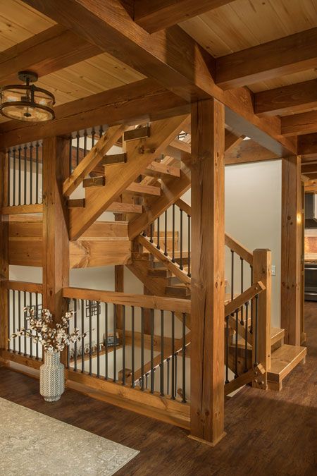 Interior Timber Elements: Stair Systems - Timberhaven Log & Timber Homes Timber Railing, Interior Steps, Rustic Modern Cabin, Cabin Stairs, Rustic Stairs, Timber Stair, Stair Well, Timber Frame Home, Timber Homes