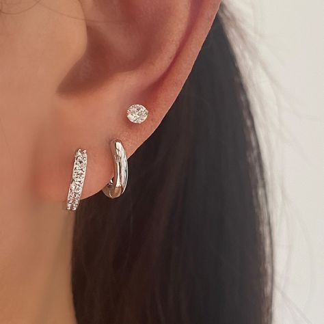 These are basic simple Silver Stud with Premium cubic zirconia, made of 925 sterling silver. Come ins 3 sizes -5mm, 4mm and 3mmMaterial: 925 Sterling Silver, Cubic ZirconiaSuitable for single use or stackingSold as a pairHypoallergenicNickel free and Lead free ♡ Have any questions or need advice on your order? Feel free to contact us. We are fast to reply. ♡ All orders are going out next business day. Silver Earrings 3 Holes, Silver Earring Stack Simple, Silver Earrings Diamond, Silver Earrings Aesthetic Vintage, 3rds Ear Piercing, Jewllery Ideas Silver, Silver Earrings Aesthetic Simple, 3 Ear Piercings Silver, Silver Earing Stacks