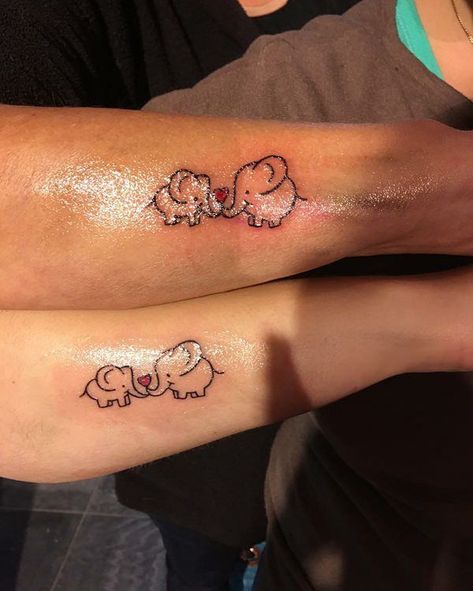 200+ Matching Mother Daughter Tattoo Ideas (2020) Designs Of Symbols With Meanings Daughter Mother Tattoos Ideas, Disney Mum Tattoo, Matching Tats For Mom And Daughter, Mum And Daughter Tattoo Disney, Matching Tattoos Mother Daughter Unique, Mon Daughter Tattoos, Tattoo Ideas Female Mother Daughter, Black Mother Daughter Tattoos, Small Matching Tattoos For Grandma And Granddaughter