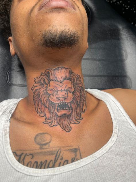 Lion Tattoo On Neck For Men, Trap Tattoos Men Neck, Lion Tattoo On Neck, Lion Throat Tattoo, Front Neck Tattoos For Men Black, Neck Tats Men, Boy Neck Tattoos, Neck Tattoo For Guys Black Men, Neck Tats For Men