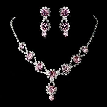 A gorgeous necklace with matching earrings featuring sparkling light rose crystals and clear rhinestones. Silver Necklace Prom, Pink Jewelry Set, Crystal Wedding Tiaras, Bridal Earrings Drop, Bridesmaid Jewelry Sets, Light Rose, Silver Jewellery Sets, Wedding Bridal Jewellery, Rhinestone Bridal