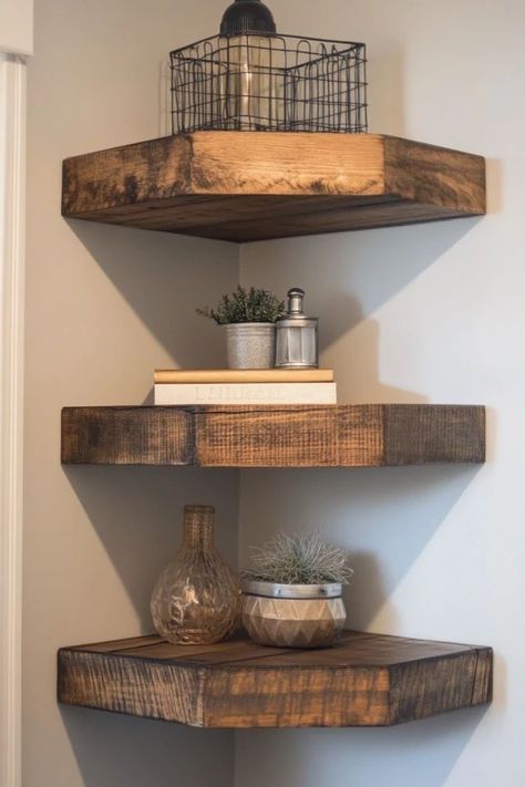 "Maximize your space with DIY floating corner shelves! Perfect for small rooms or awkward corners. 🛠️✨ #DIYHomeDecor #CornerShelves #SpaceSaving" Diy Floating Corner Shelves, Corner Shelf Decor, Diy Corner Shelves, Small Corner Shelves, Corner Floating Shelves, Diy Corner Shelf, Rustic Corner Shelf, Corner Shelf Ideas, Corner Shelf Design