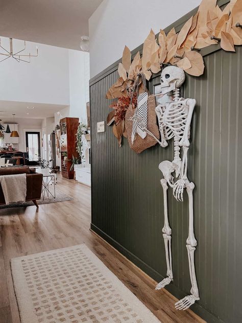 entryway with bead board paneling and a large skeleton hanging from peg hooks Bead Board Entryway Ideas, Halloween Tour, Peg Hooks, Apt Ideas, Bead Board, Spooky Decor, Fall Diy, Easy Diy Projects, Autumn Home