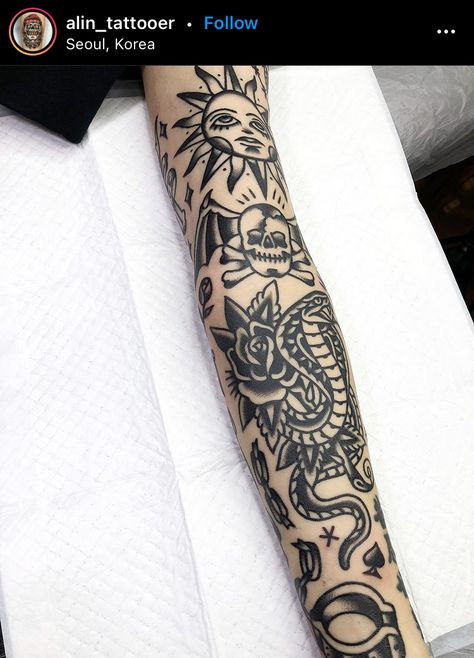 cobra, skull with wings, sun, and handcuffs Black And Grey American Traditional Sleeve, Traditional Tattoo Sun, American Traditional Blackwork, American Traditional Filler Tattoo, Traditional Tattoo Sleeve Filler, Blackwork Sleeve, Traditional Sleeves, Traditional Blackwork, Old School Tattoo Sleeve