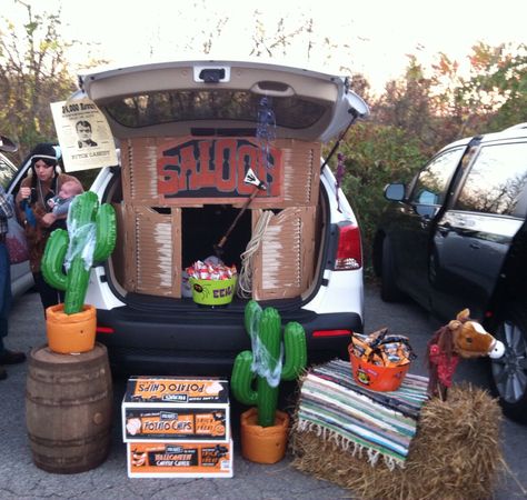 Saloon Trunk or Treat Country Themed Trunk Or Treat, Saloon Trunk Or Treat, Western Trunk Or Treat Ideas For Cars, Cowboy Theme Trunk Or Treat, Trunk Or Treat Western Theme, Wild West Trunk Or Treat Ideas, Horse Trunk Or Treat, Trunk Or Treat Cowboy Theme, Western Theme Trunk Or Treat