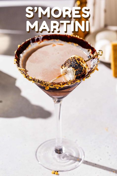 S'Mores Martini S’mores Espresso Martini Recipe, Creamy Halloween Cocktails, S’more Martini, Toasted Marshmallow Espresso Martini, Smores Espresso Martini, S’mores Cocktail Recipe, S’mores Martini Recipe, S’mores Martini, Smore Martini