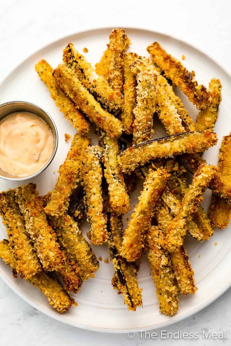 These eggplant fries are coated in panko and parmesan and baked in the oven until they're wonderfully crispy. They make a great family-friendly side dish or simple appetizer. You'll NEVER guess that they're made with eggplant! #theendlessmeal #eggplantfries #fries #frenchfries #bakedfries #eggplant #eggplantrecipes Eggplant Ideas, Oven Fried Eggplant, Baked Eggplant Fries, Fresh Veggie Recipes, Spicy Sweet Potato Fries, Eggplant Chips, Eggplant Fries, Crispy Eggplant, Parmesan Fries