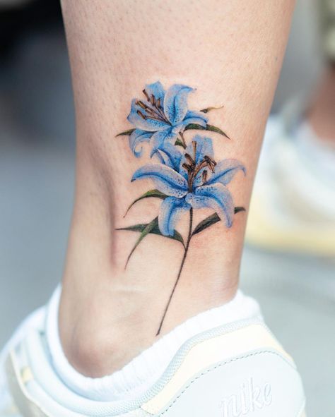 Lily Tattoo Designs Blue Lillies Tattoo, Stargazer Lilies Tattoo, Color Lilly Tattoo, Blue Lily Tattoo, Colored Lily Tattoo, Lilly Tattoo Color, Lily Tattoo Color, Blue Flower Tattoo, Amaryllis Tattoo