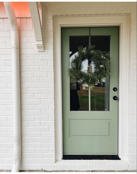 Credit: Lesley W. Graham Sage Green Doors Exterior, Bm Green Paint Colors, Sage Green Front Door, Green Front Door Colors, Provia Doors, Home Exterior Colors Schemes, Cottage Shutters, Green Front Door, Exterior Door Colors