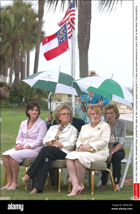 Download this stock image: (l to r) Mrs. Cherie Blair, Mrs. Bernadette Chirac, Lyudmila Putin, listen as Mrs. Laura Bush speaks during the G8 leaders wives press conference on June 9, 2004, on Sea Island. Photo by ABACA. - 2EA8CDH from Alamy's library of millions of high resolution stock photos, illustrations and vectors. Johnny Crawford, Laura Bush, Sea Island, Press Conference, Umbrella, High Resolution, Resolution, Stock Photos, Illustrations