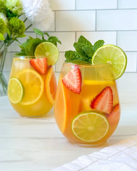 White Tropical Sangria Tropical Sangria Recipe, Tropical Sangria, Batch Cocktails, Sangria Recipe, Apple Brandy, Slice Of Lime, Lemon Lime Soda, Sangria Recipes, Fresh Fruits